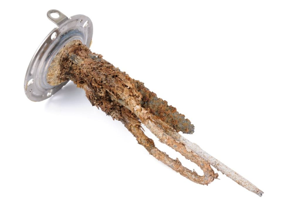 Corroded Heating Element of Tank Water Heater with Scum and Sediment Buildup